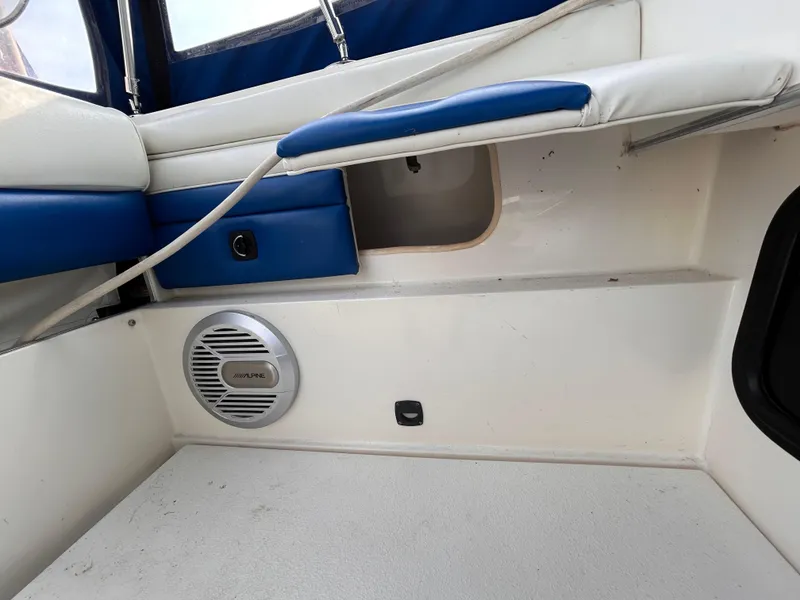 Slide: The Image of Interior of 1992 Chaparral Signature 30 boat with blue and white seating. - 23