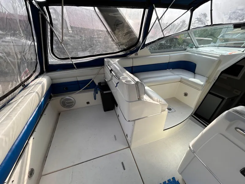Slide: The Image of 1992 Chaparral Signature 30 boat interior with white and blue seating. - 25