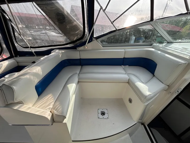 Slide: The Image of 1992 Chaparral Signature 30 boat interior with white and blue seating. - 28