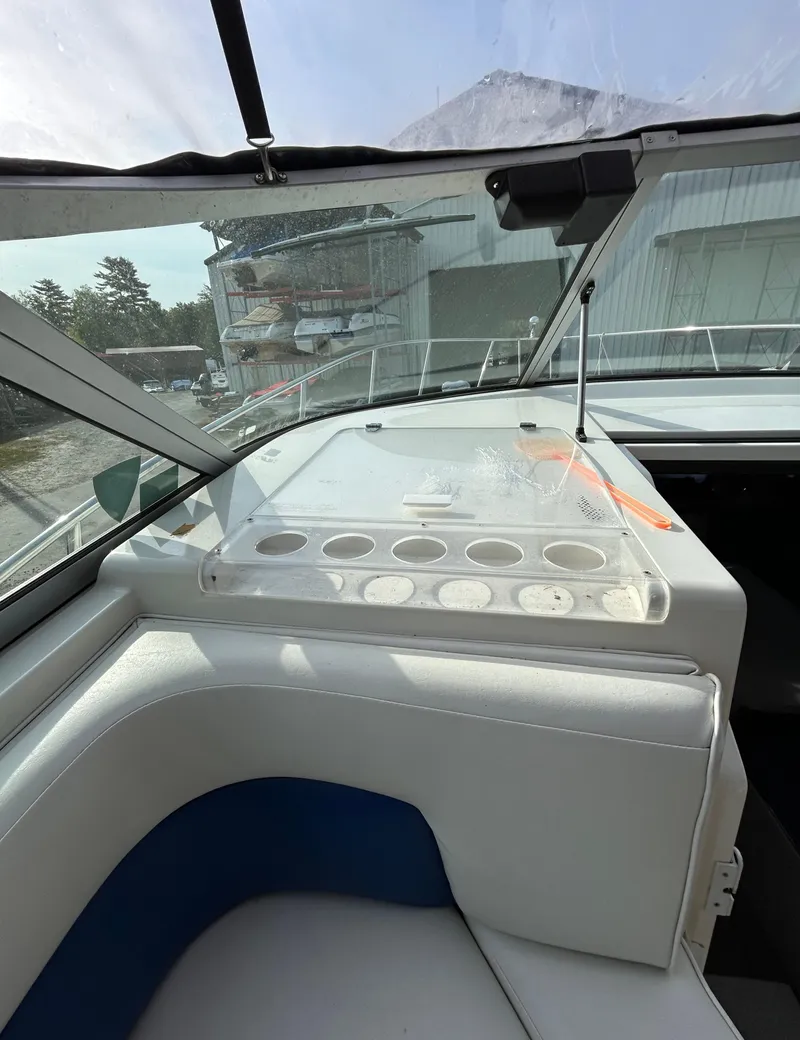 Slide: The Image of Interior view of 1992 Chaparral Signature 30 boat, featuring seating and dashboard details. - 31