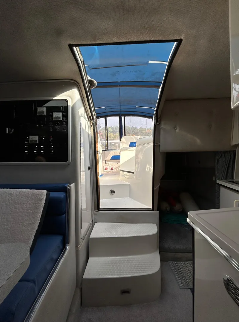 Slide: The Image of Interior of 1992 Chaparral Signature 30 boat with skylight and seating area. - 43
