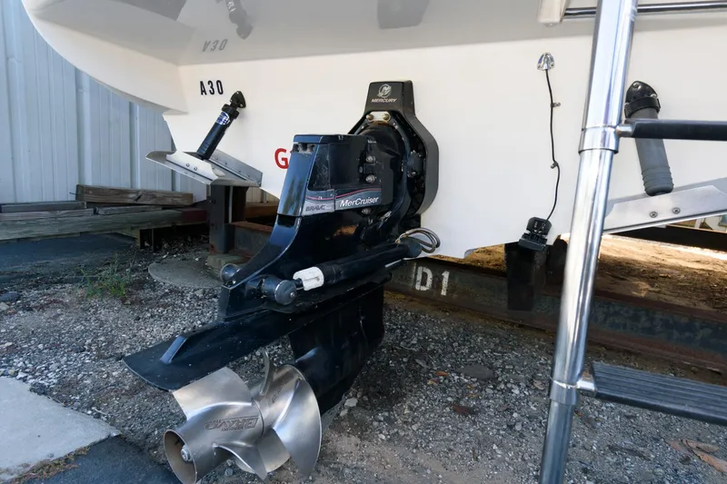 Slide: The Image of 2011 Sea Ray 260 Sundancer boat with MerCruiser outdrive on a trailer. - 16