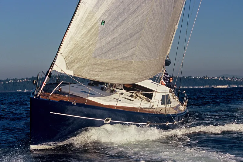 Slide: The Image of 2002 Northern Marine Pilothouse Sloop sailing on open water. - 2