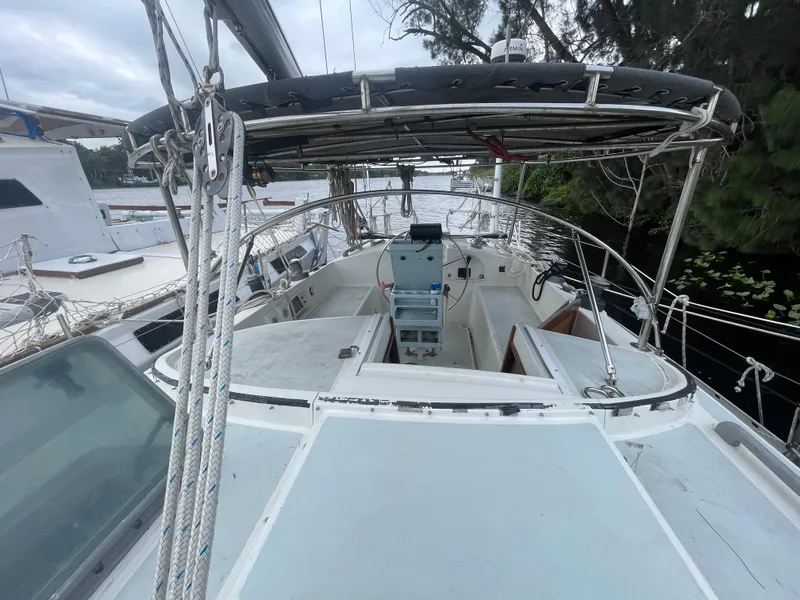 Slide: The Image of 1979 Moody 36 Classic sailboat cockpit with steering wheel and rigging. - 15