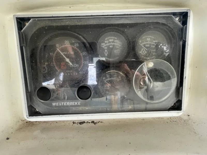 Slide: The Image of Control panel of a 1979 Moody 36 Classic boat with Westerbeke gauges. - 34