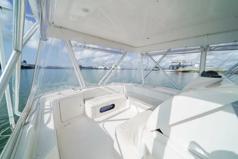 Slide: The Image of 2007 Bertram 510 Convertible boat interior with panoramic water views. - 16