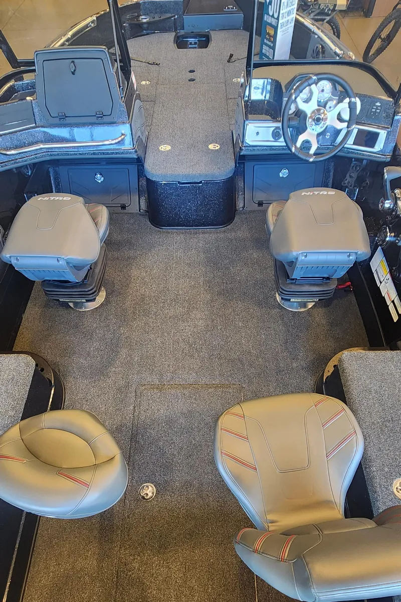Slide: The Image of 2024 Nitro ZV21 boat interior with seating and steering wheel. - 3