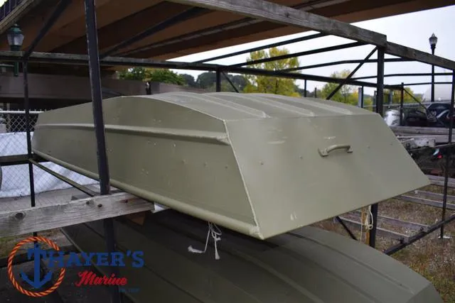 Slide: The Image of 2025 Lund 1240 Jon Tiller boat in storage at Thayer's Marine. - 3