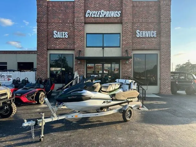 Slide: The Image of 2025 Kawasaki Jet Ski Ultra 160, sleek design, advanced features, green and white color scheme. - 1