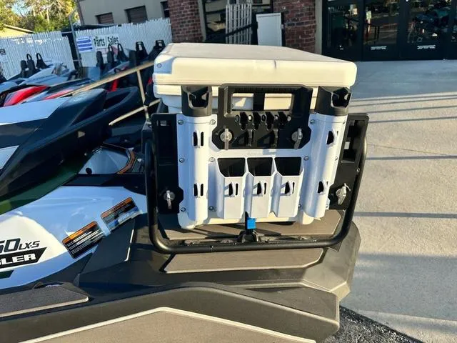 Slide: The Image of 2025 Kawasaki Jet Ski Ultra 160 with mounted storage rack and cooler. - 7