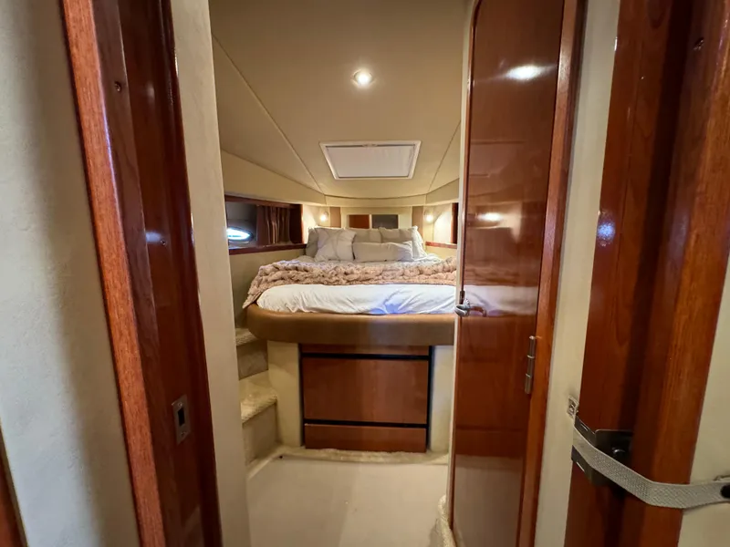 Slide: The Image of Luxurious cabin interior of 2006 Sea Ray 38 Sundancer yacht with cozy bed. - 35