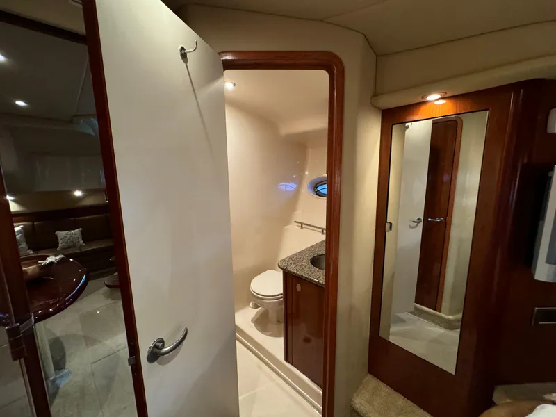 Slide: The Image of Interior of 2006 Sea Ray 38 Sundancer yacht showing bathroom and mirror. - 43