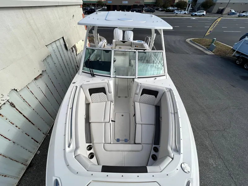 Slide: The Image of 2024 Sailfish 276 DC boat with spacious seating and modern design. - 14