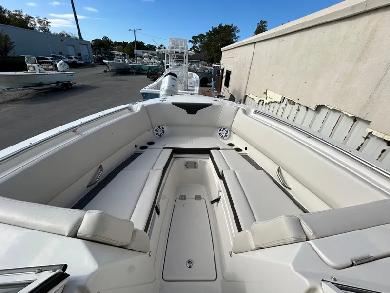Slide: The Image of 2024 Sailfish 276 DC boat interior with spacious seating and storage. - 15
