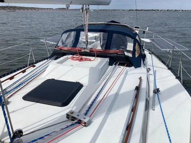Slide: The Image of 1988 C&C 41 sailboat on water, featuring deck and rigging details. - 17