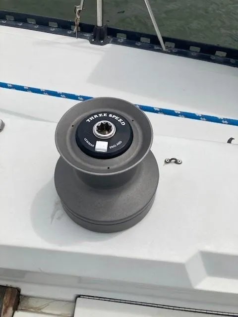 Slide: The Image of Sailboat winch on 1988 C&C 41 deck, labeled "Three Speed." - 33