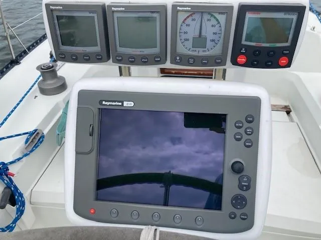 Slide: The Image of Sailing instruments on a 1988 C&C 41 yacht, featuring Raymarine displays. - 47