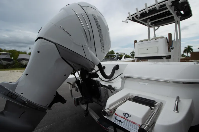 Slide: The Image of 2020 Caymas 28 HB boat with powerful outboard motor, rear view. - 7