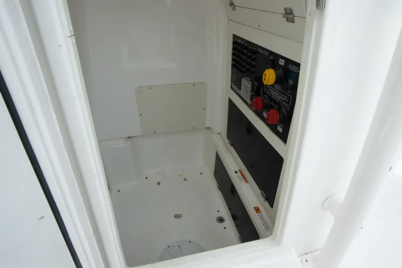 Slide: The Image of 2020 Caymas 28 HB boat interior compartment with control panel. - 8