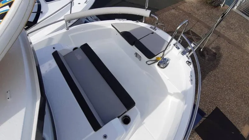 Slide: The Image of 2025 Jeanneau 795 SPORT S2 boat deck with seating and railing. - 5