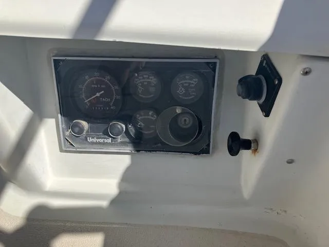 Slide: The Image of Control panel of a 1989 Ericson 35 MKIII sailboat with gauges and switches. - 6