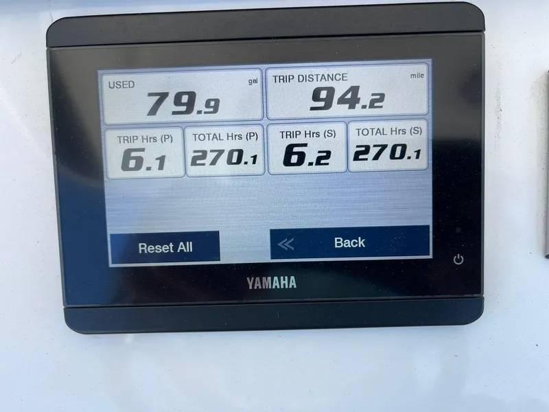 Slide: The Image of Yamaha display showing fuel usage, trip distance, and hours for a 2022 Regulator 31 boat. - 13