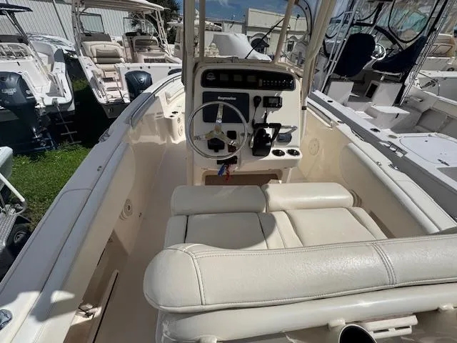 Slide: The Image of 2015 Grady-White Fisherman 257 boat interior with steering console and seating. - 21