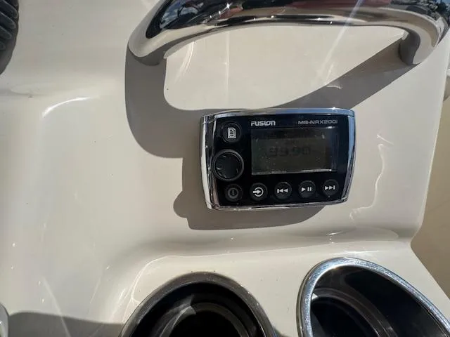 Slide: The Image of Fusion stereo system on 2015 Grady-White Fisherman 257 boat dashboard. - 29