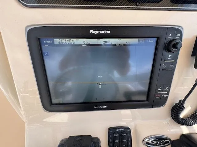 Slide: The Image of Raymarine navigation system on 2015 Grady-White Fisherman 257 boat dashboard. - 31