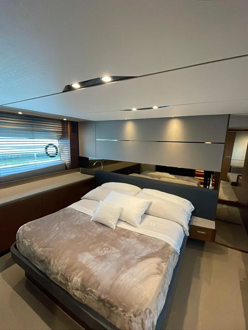 Slide: The Image of Luxurious bedroom interior of 2017 Princess S65 yacht with modern design and cozy bedding. - 12