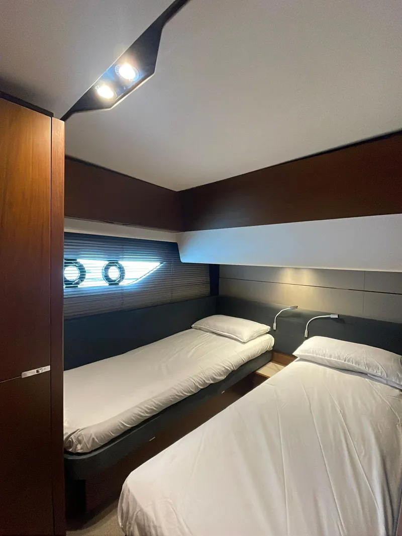 Slide: The Image of Interior of 2017 Princess S65 yacht with twin beds and modern lighting. - 16