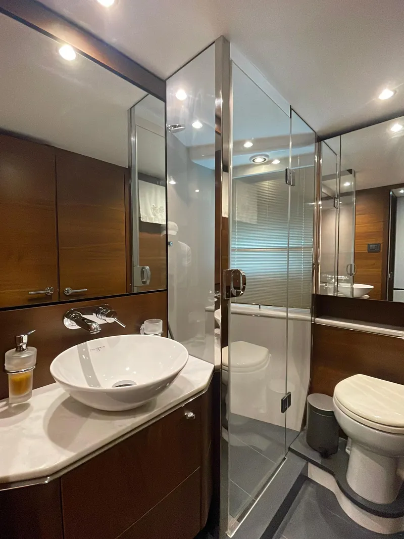 Slide: The Image of Luxurious 2017 Princess S65 yacht bathroom with modern fixtures and elegant wood accents. - 17