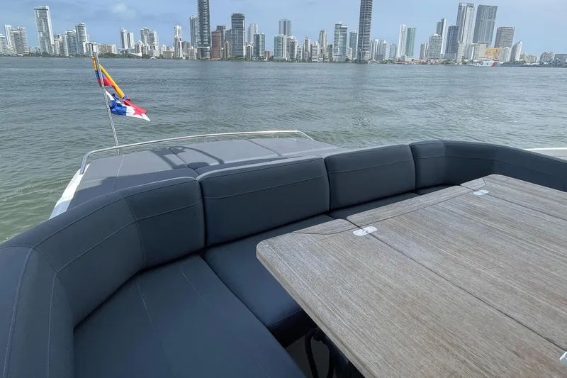 Slide: The Image of Luxury yacht Princess S65, 2017 model, with city skyline view. - 2