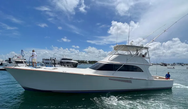 Slide: The Image of 1999 Hines-Farley SPORTFISHERMAN yacht cruising on a sunny day with clear skies. - 5