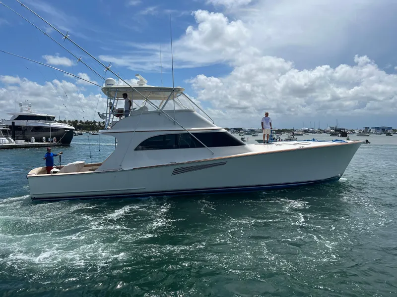 Slide: The Image of 1999 Hines-Farley SPORTFISHERMAN yacht cruising on a sunny day with people on board. - 7
