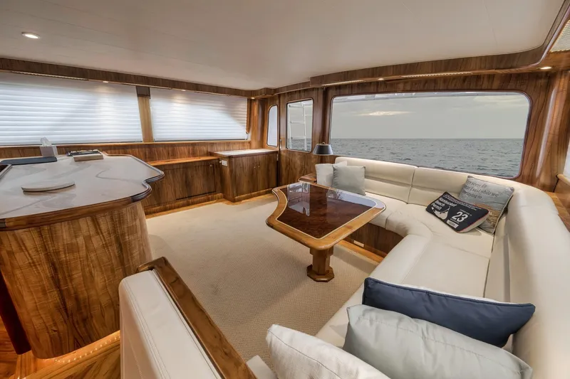 Slide: The Image of Luxurious 1999 Hines-Farley SPORTFISHERMAN yacht interior with elegant wood finish and ocean view. - 85