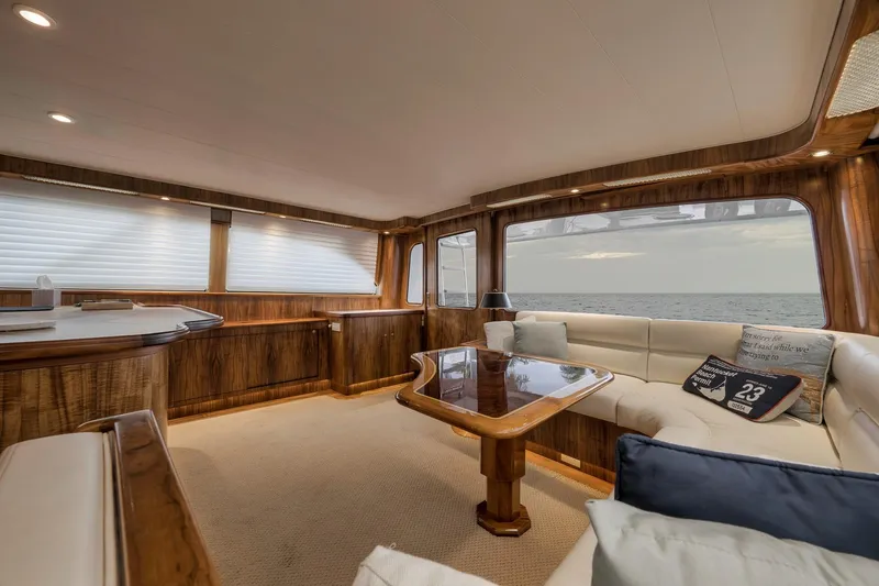 Slide: The Image of Luxurious 1999 Hines-Farley SPORTFISHERMAN yacht interior with elegant wood finishes and ocean view. - 86