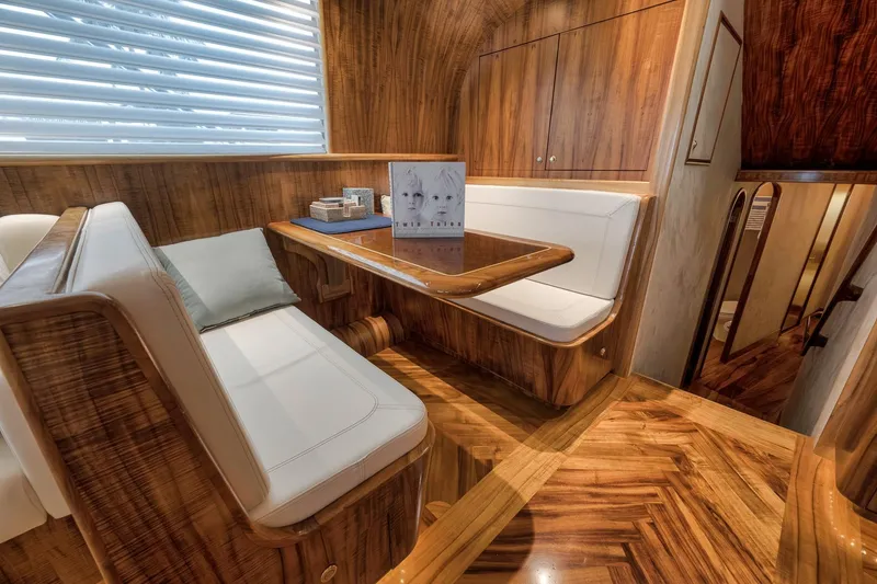 Slide: The Image of Luxurious 1999 Hines-Farley SPORTFISHERMAN yacht interior with elegant wood finish and cozy seating. - 88