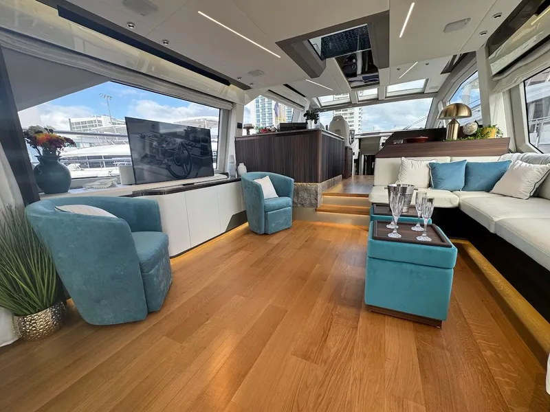 Slide: The Image of Luxurious interior of 2024 Aicon 66 Vivere yacht with modern furnishings and panoramic windows. - 16