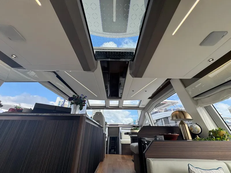 Slide: The Image of Luxurious interior of 2024 Aicon 66 Vivere yacht with skylight and modern design. - 17