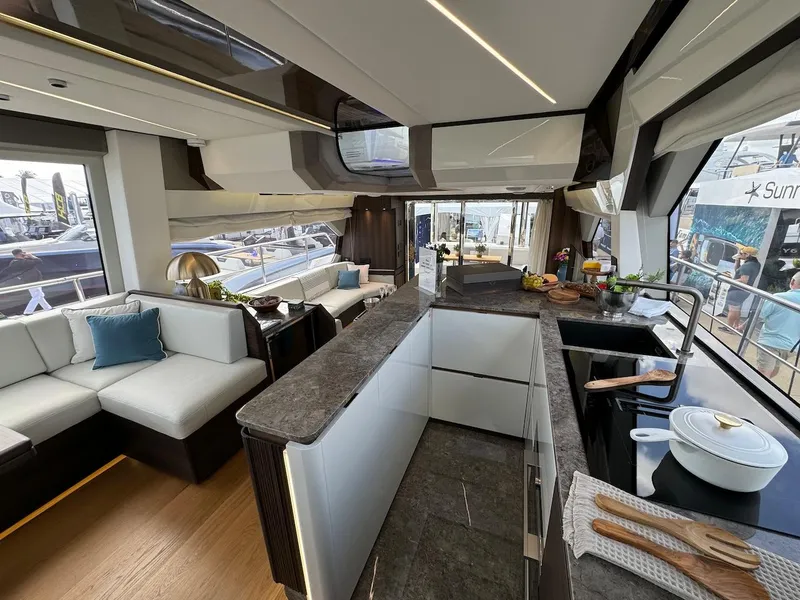 Slide: The Image of Luxurious interior of 2024 Aicon 66 Vivere yacht with modern kitchen and seating area. - 20