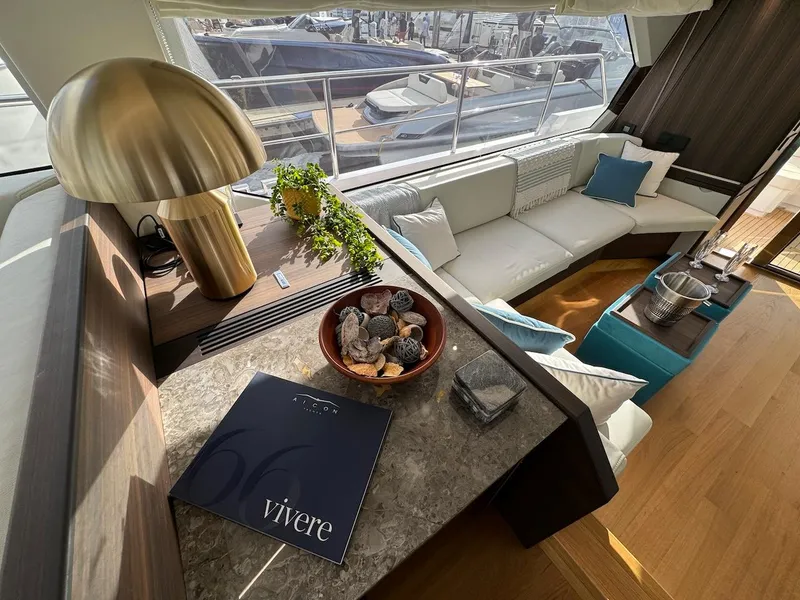 Slide: The Image of Luxurious interior of 2024 Aicon 66 Vivere yacht with elegant decor and seating. - 26