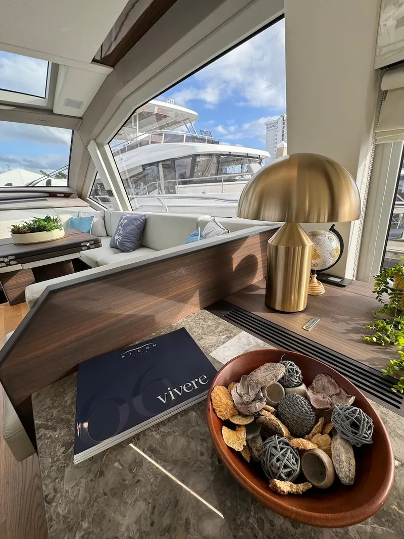 Slide: The Image of Luxurious interior of 2024 Aicon 66 Vivere yacht with modern decor and scenic view. - 27