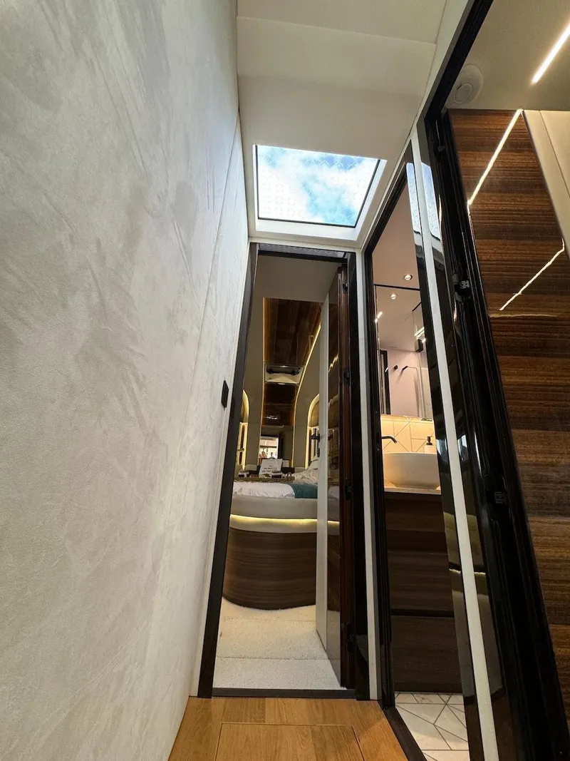 Slide: The Image of Interior view of 2024 Aicon 66 Vivere yacht with skylight and modern design. - 29
