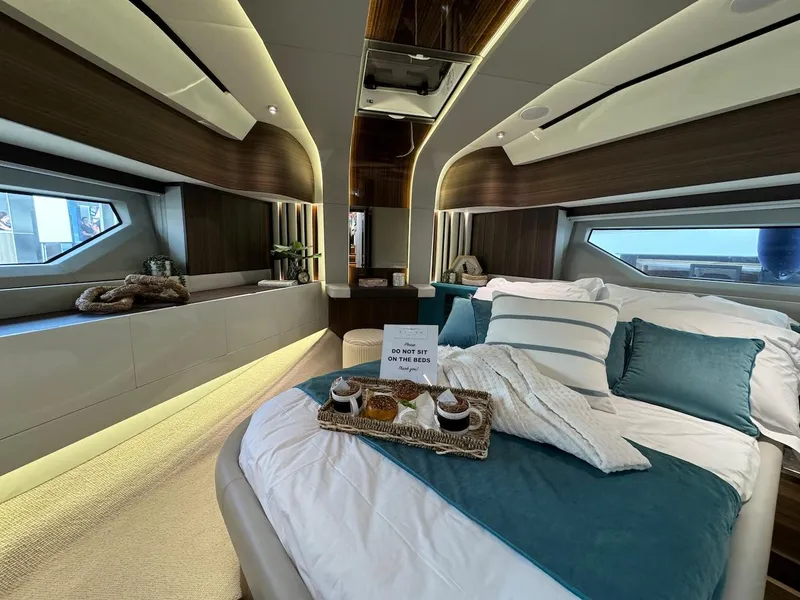 Slide: The Image of Luxurious 2024 Aicon 66 Vivere yacht bedroom with elegant decor and breakfast tray. - 31