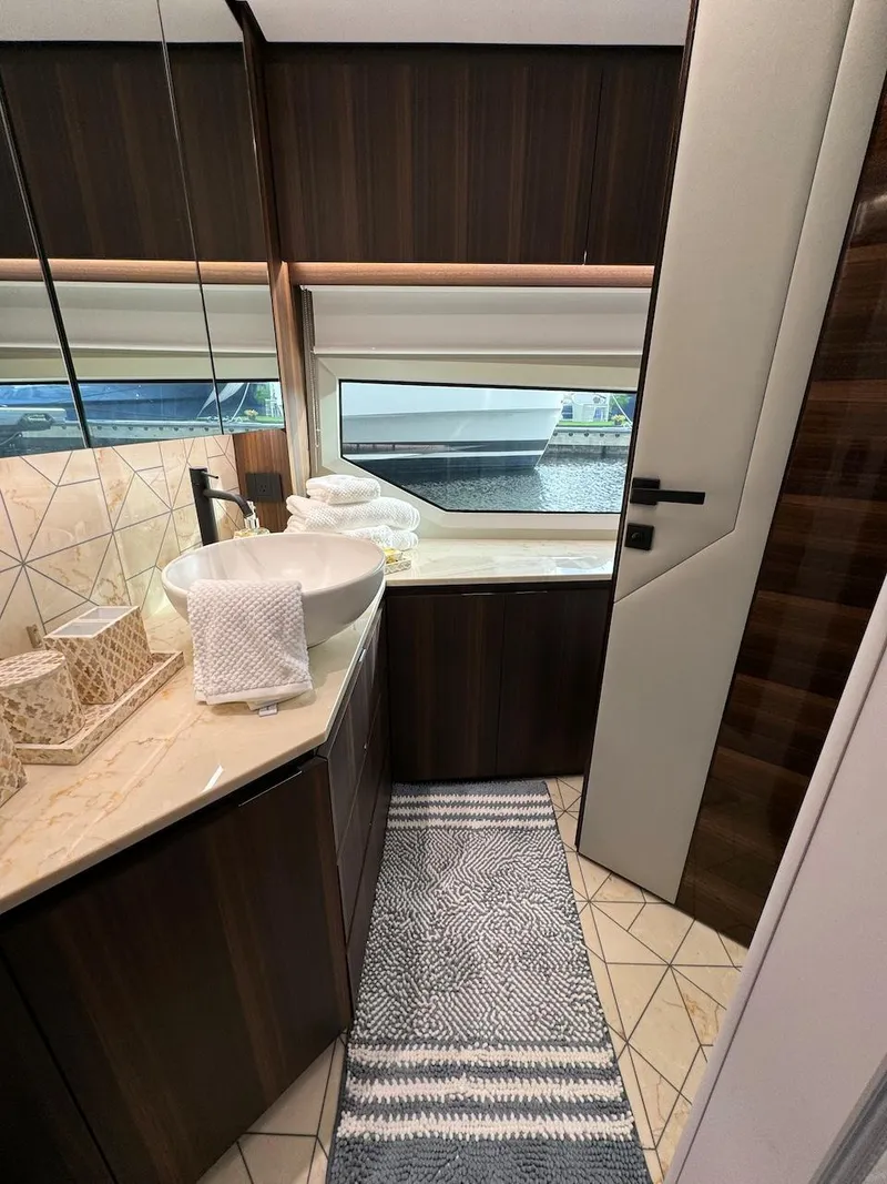 Slide: The Image of Luxurious bathroom interior of 2024 Aicon 66 Vivere yacht with modern fixtures and elegant design. - 34