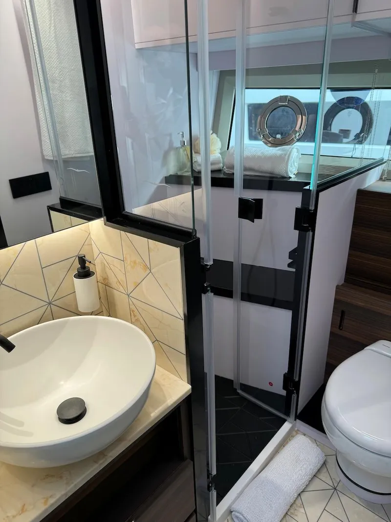 Slide: The Image of Luxurious bathroom in 2024 Aicon 66 Vivere yacht with modern fixtures and elegant design. - 42