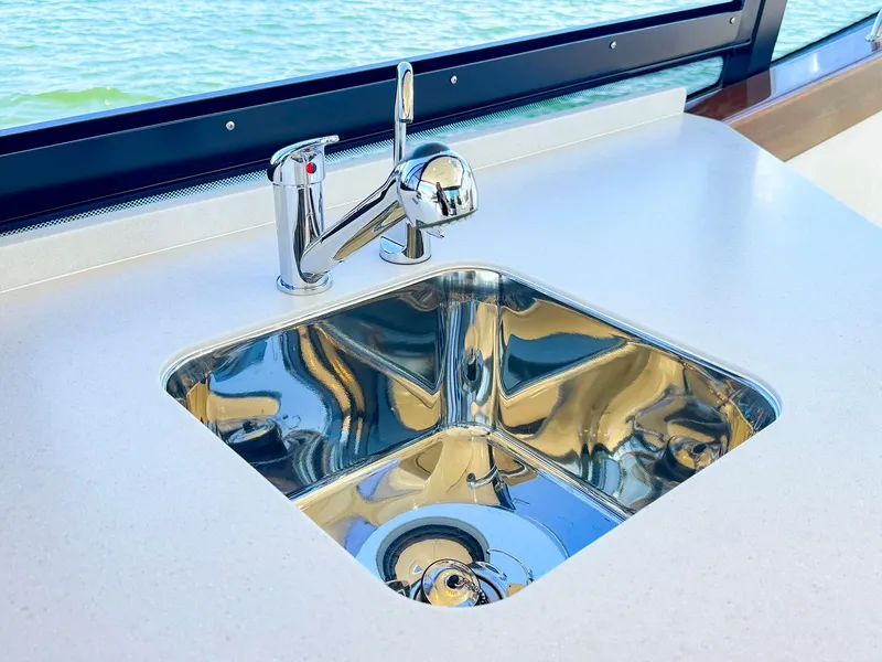Slide: The Image of Stainless steel sink on 2024 MJM 4 yacht with ocean view. - 24
