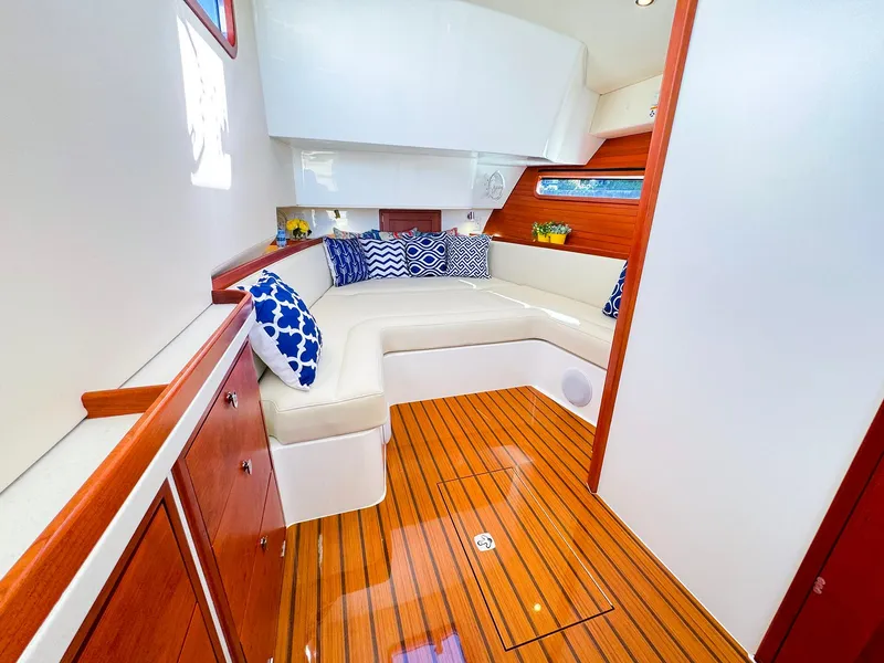 Slide: The Image of Luxurious 2024 MJM 4 yacht interior with elegant seating and wooden flooring. - 35