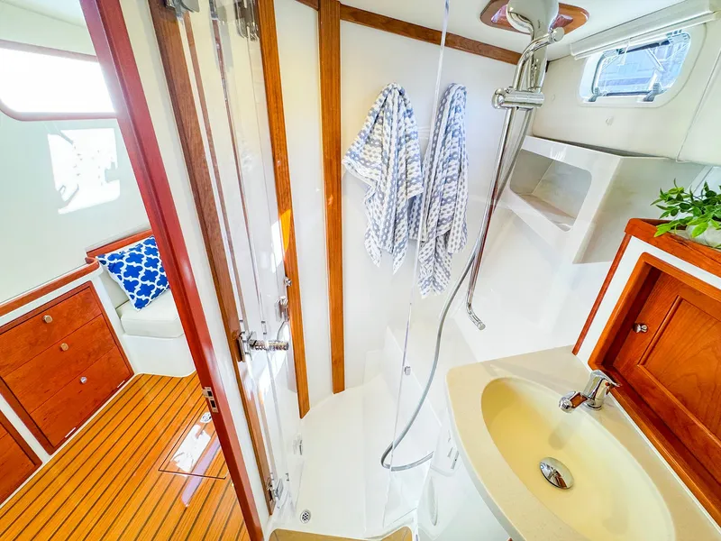 Slide: The Image of Luxurious 2024 MJM 4 yacht bathroom with wooden accents and modern fixtures. - 39